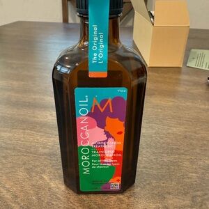 Moroccanoil Treatment in Black and Green Bottle